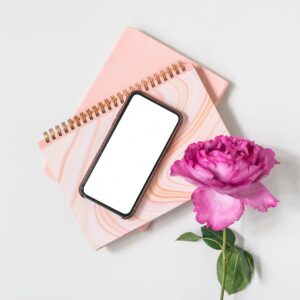 Smartphone with pink rose.
